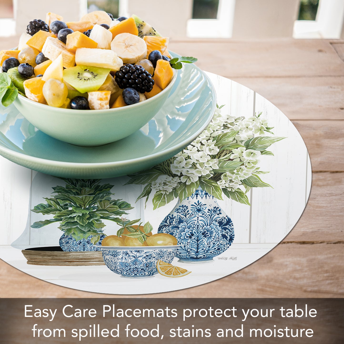 CounterArt Blue & White Pottery 4 Pack Round Reversible Easy Care Flexible Placemats Made in the USA