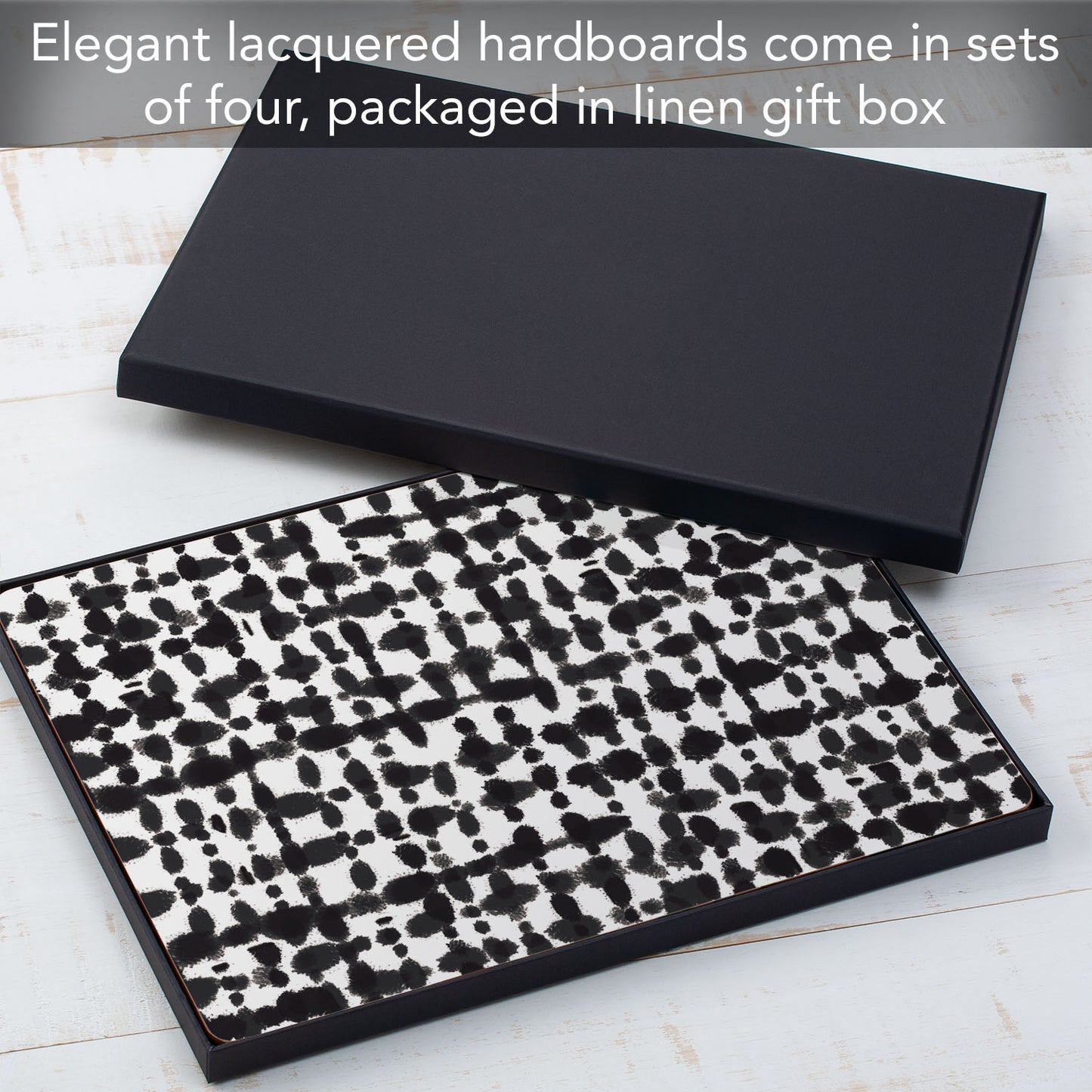 CounterArt Black Spots Premium Decorative Hardboard Tabletop Placemats 4-Pack Manufactured in The USA Heat Tolerant and Easily Wipes Clean
