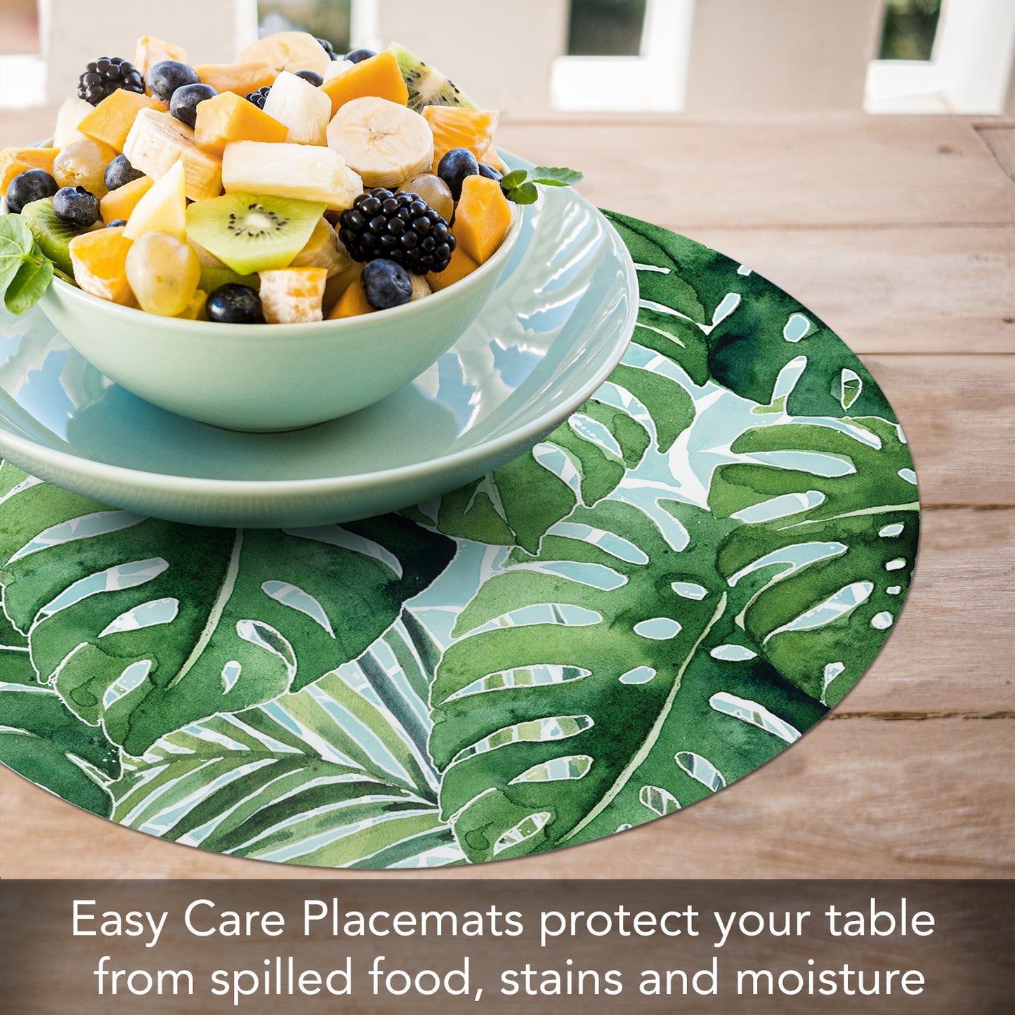 CounterArt Tropical Foliage 4 Pack Round Reversible Easy Care Flexible Placemats Made in the USA